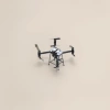 Black four-axis drone aerial photography stabilizer, high-definition remote control, foldable and portable Application Scenario